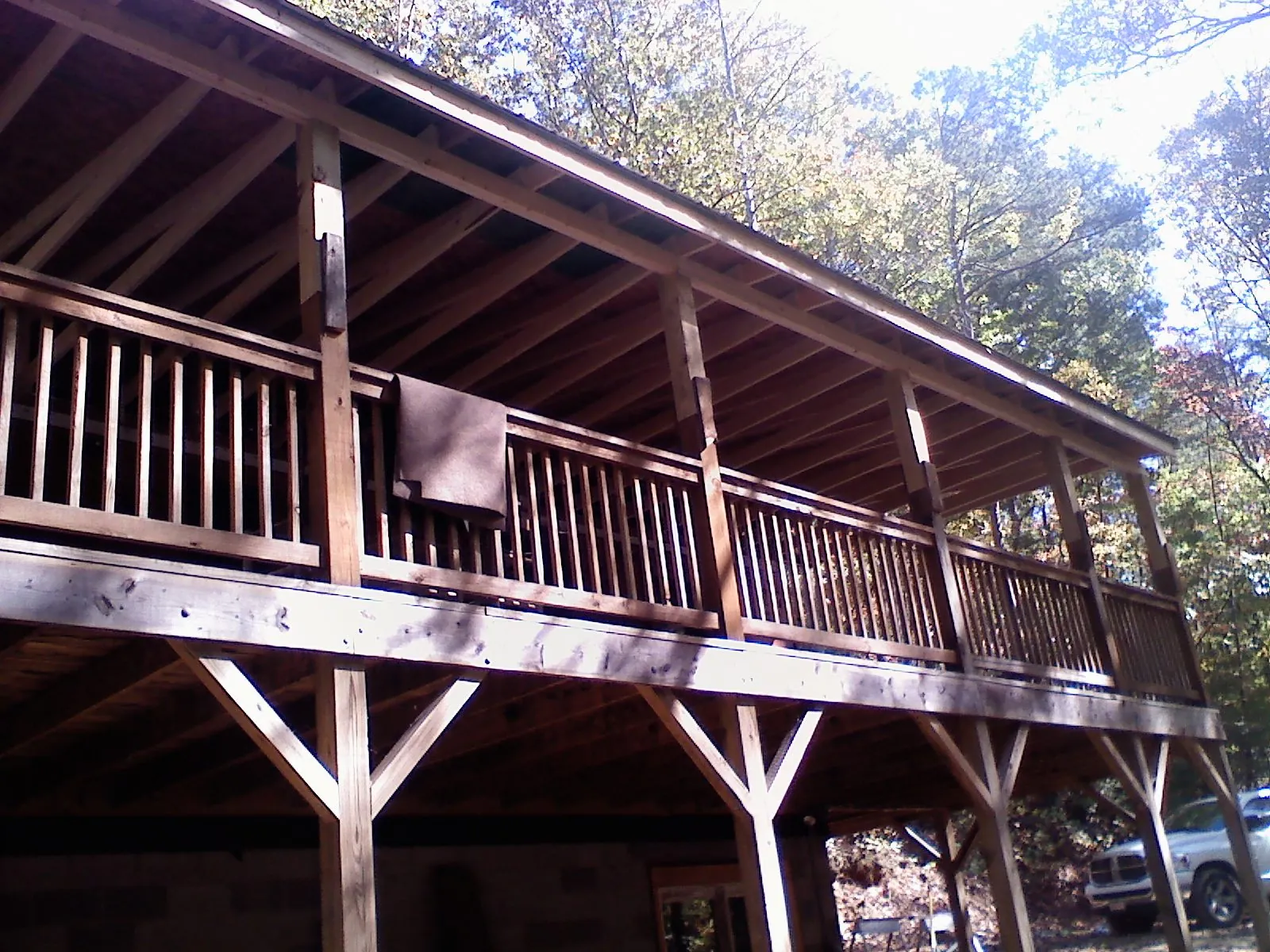 Timber framing under a new elevated porch and deck — Roof Leak Repair in Cade by Roofing Brothers